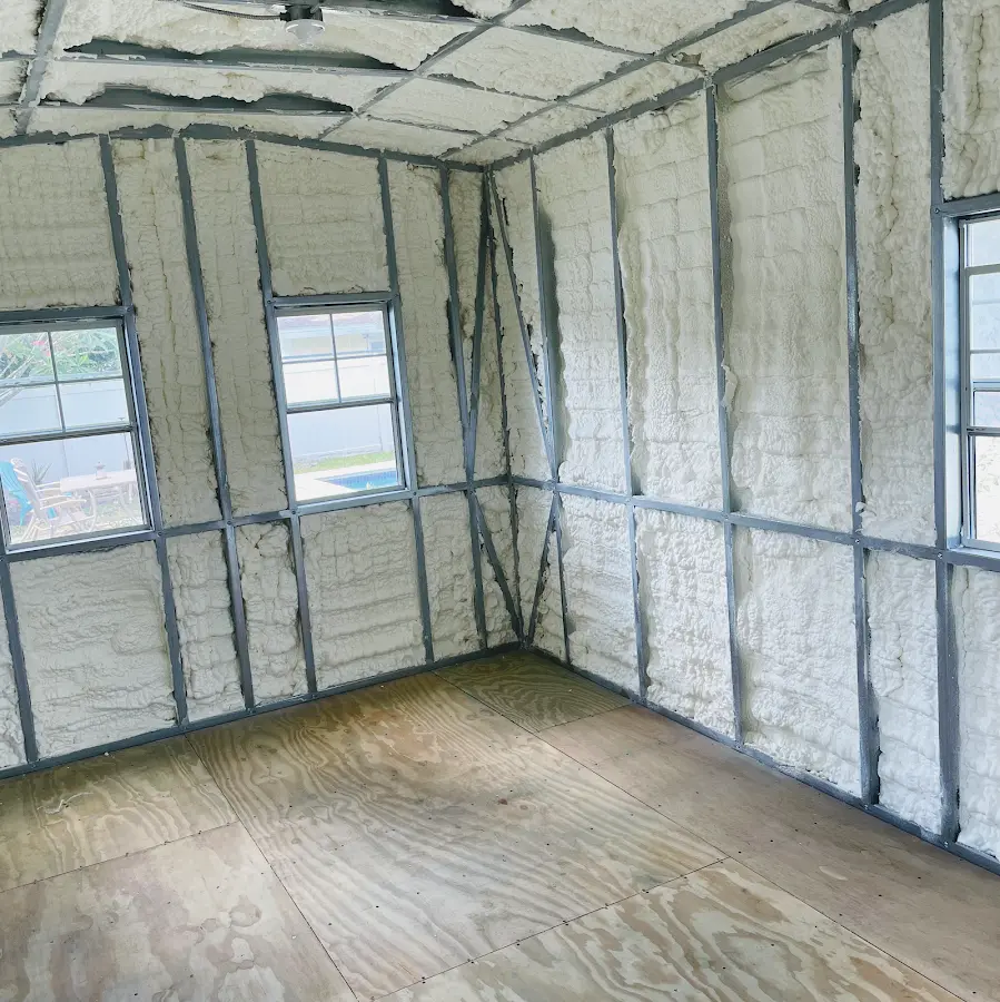 Closed-cell spray foam insulation applied to wall cavities in a residential project in Mountain Brook
